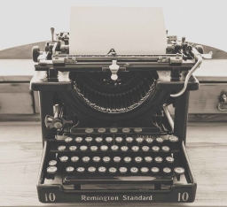 remington standard typewriter in greyscale photography